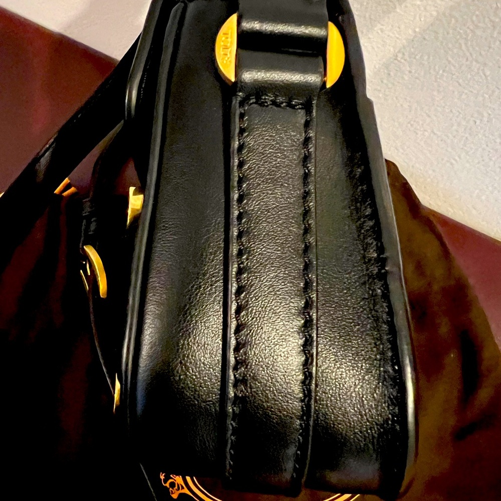 Todd crossbody bag   Made in Italy dimensions 6.7x5.9x3”  real leather black.
